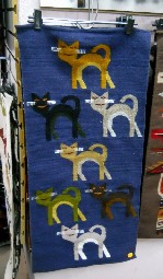 Tejido mostrando gatos, primer plano