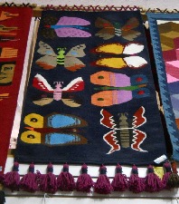 Tejido mostrando mariposas