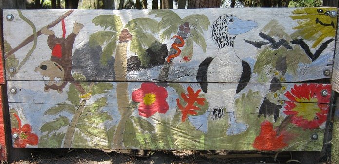 Urwald mit Affe, Palmen, Blumen, einem
                            Riesenvogel, mit dem Meer im Hintergrund mit
                            Felseninseln und einer fr�hlichen Sonne,
                            Grossaufnahme