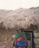 Dwelling house 07: Roof construction with
                      grand mother before the house