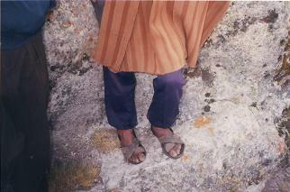 The ind�gena grandfather with feet without
                      socks