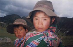 Girl with baby on her back, closeup