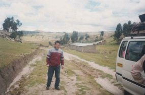The
                      ind�gena, and a hamlet in the background