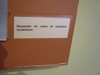 Text about the live in caves:
                            The hunters and gatherers making rest in a
                            cave