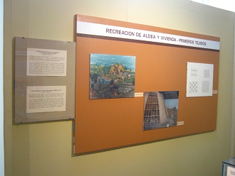 Big board
                            about house constructioning of hunters and
                            gatherers