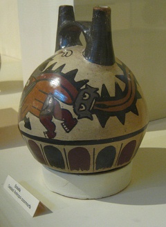 Ceramic bottle of Nazca
                                    culture, the bottom of the god has
                                    got a long tail