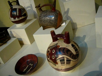Ceramic bottle with the design
                                    of a wild cat