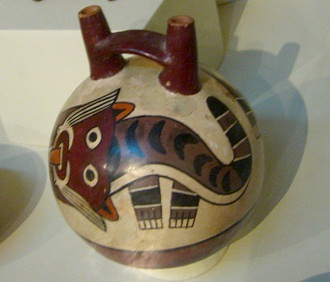 Ceramic bottle with the design
                                    of a wild cat, close-up