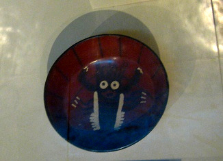 Plate with the painting of a
                                    god, close-up