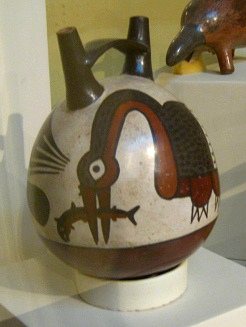 Ceramic bottle with a heron
                                    eating a fish 03