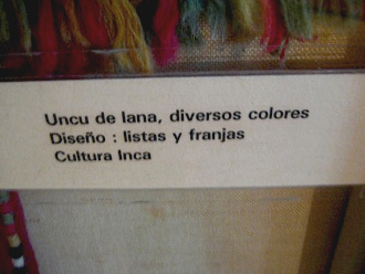 Text: Multicolored woolen cape
                              (uncu); design: bands and fringes; Inca
                              culture